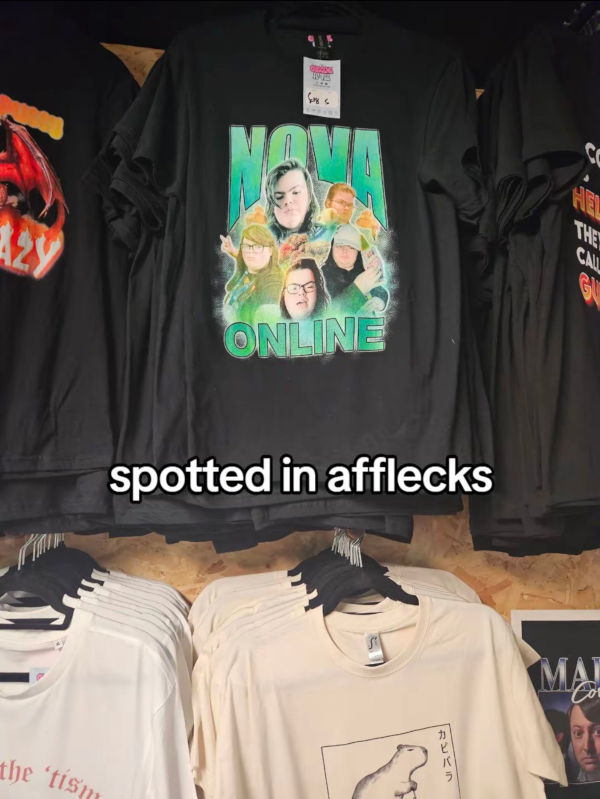 T-shirts featuring a collage of thumbnails from videos criticising Nova and the words "Nova Online" with edited-in text "spotted in afflecks" underneath.